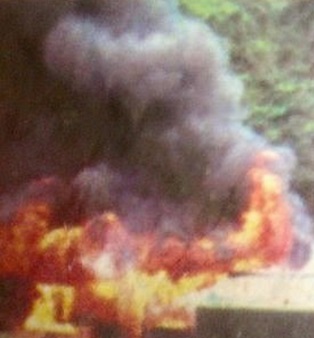 West Papuan houses being burnt by the Indonesian military and police in Timika