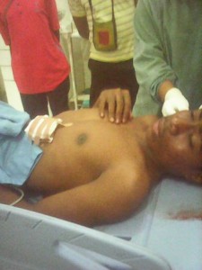 Efrando Sabarofek (17) being treated in hospital after being shot by the Indonesian police yesterday